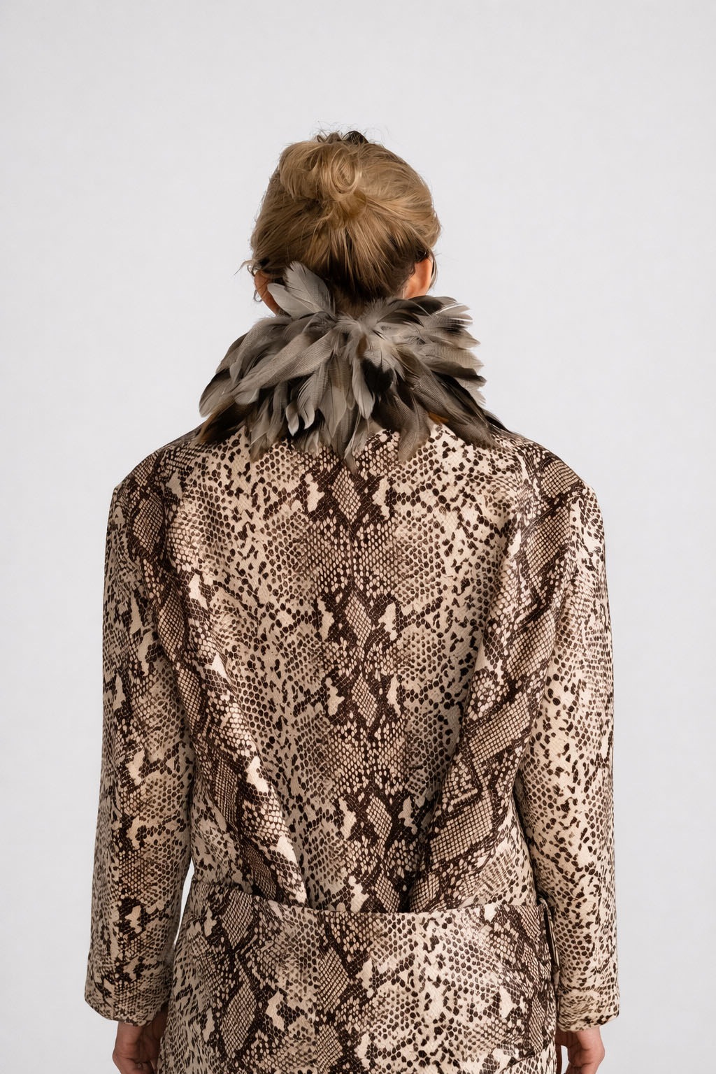 Myus FW26 Python Coat, python embossed calfskin leather handsewn guinea feathers