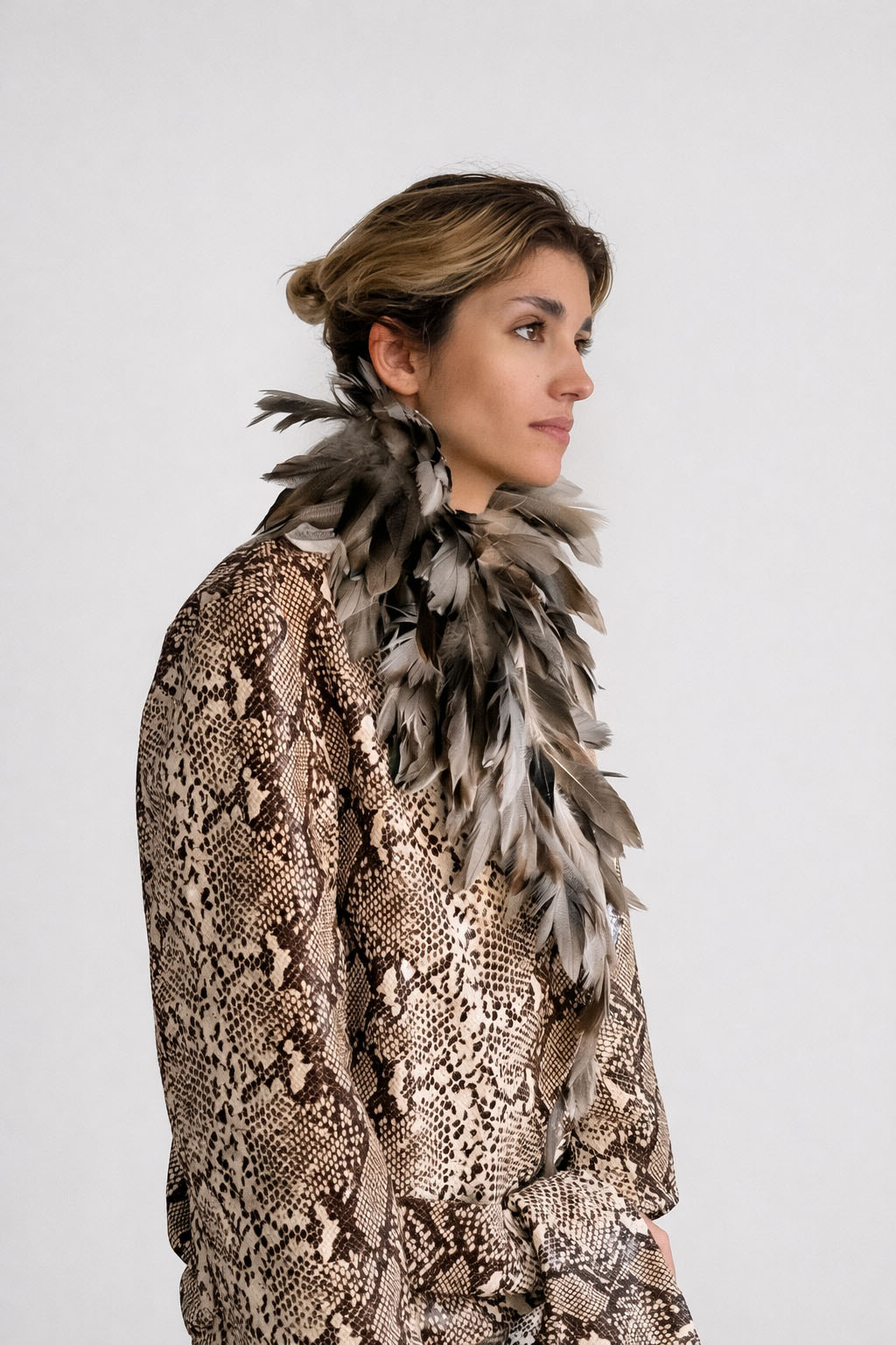 Myus FW26 Python Coat, python embossed calfskin leather handsewn guinea feathers
